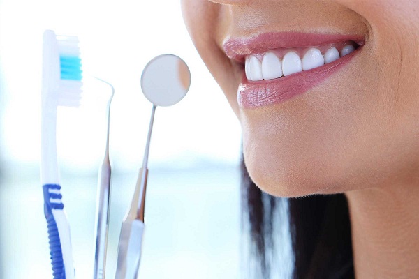 White teeth, toothbrush and dental equipment